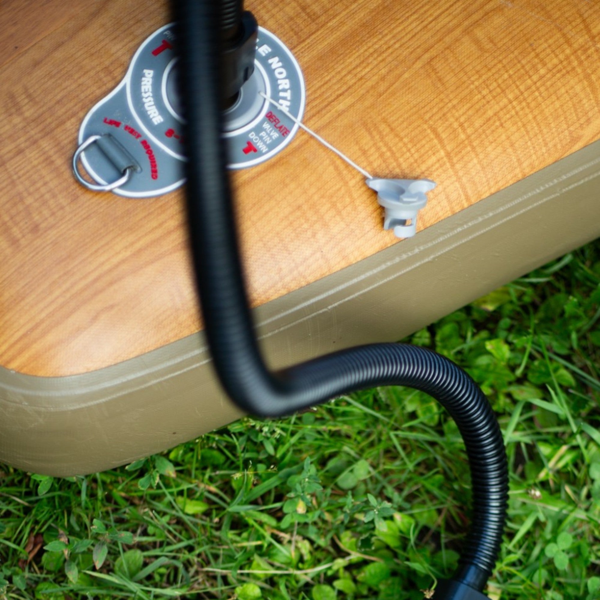 pump hose going into inflatable paddle board how to inflate isup