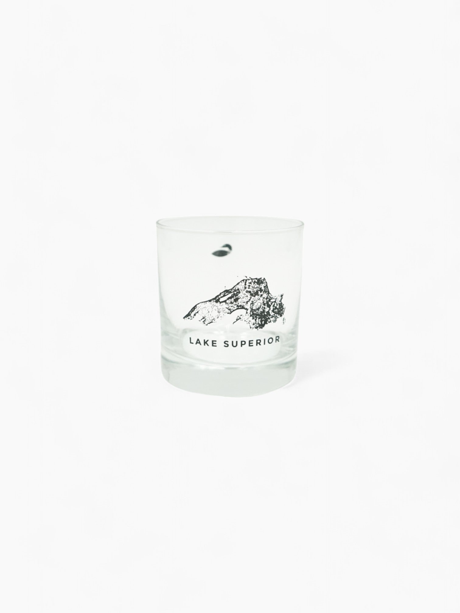 Glass with Lake Superior printed on it.
