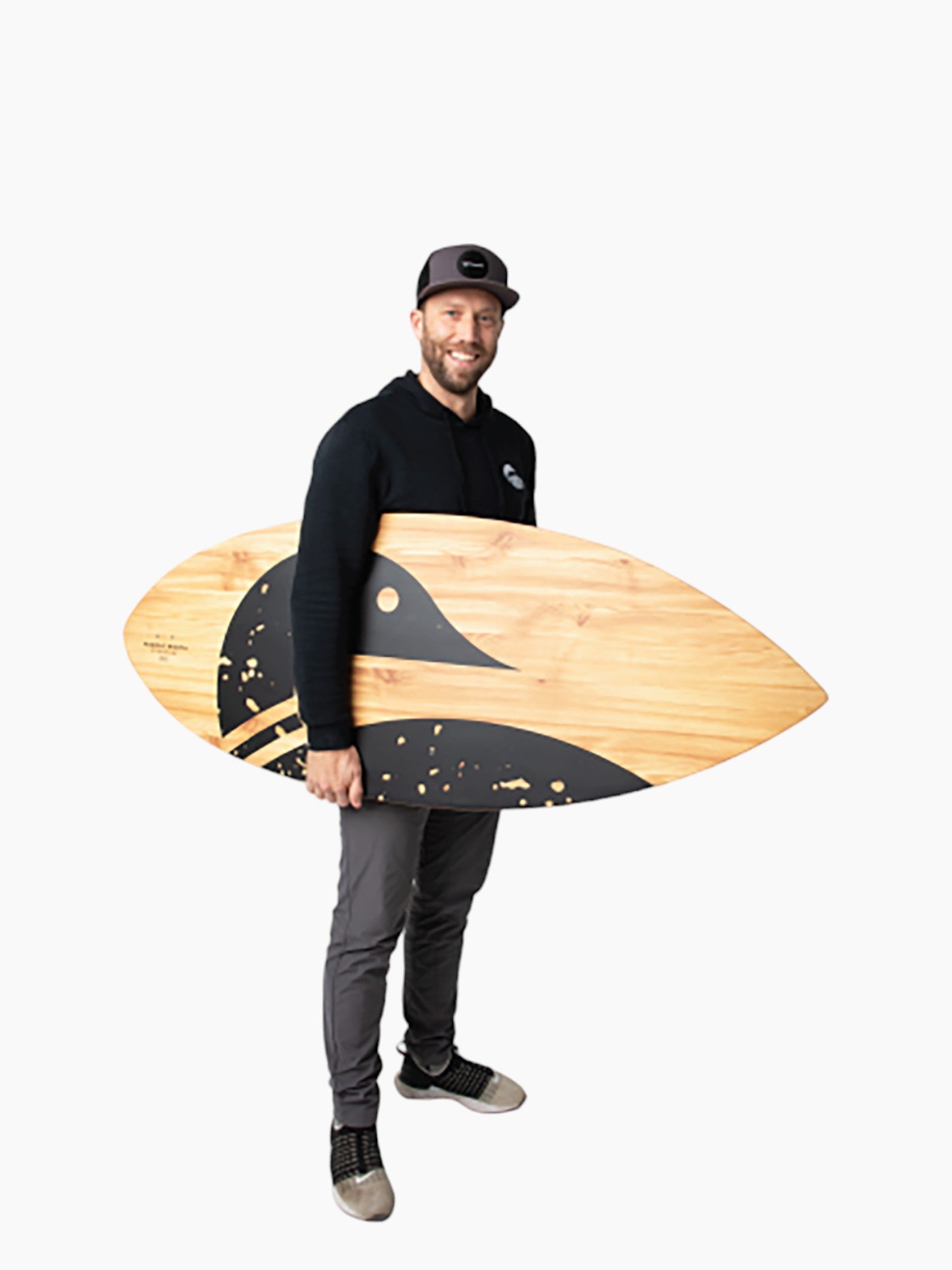 Person holding a wooden lake surfer.