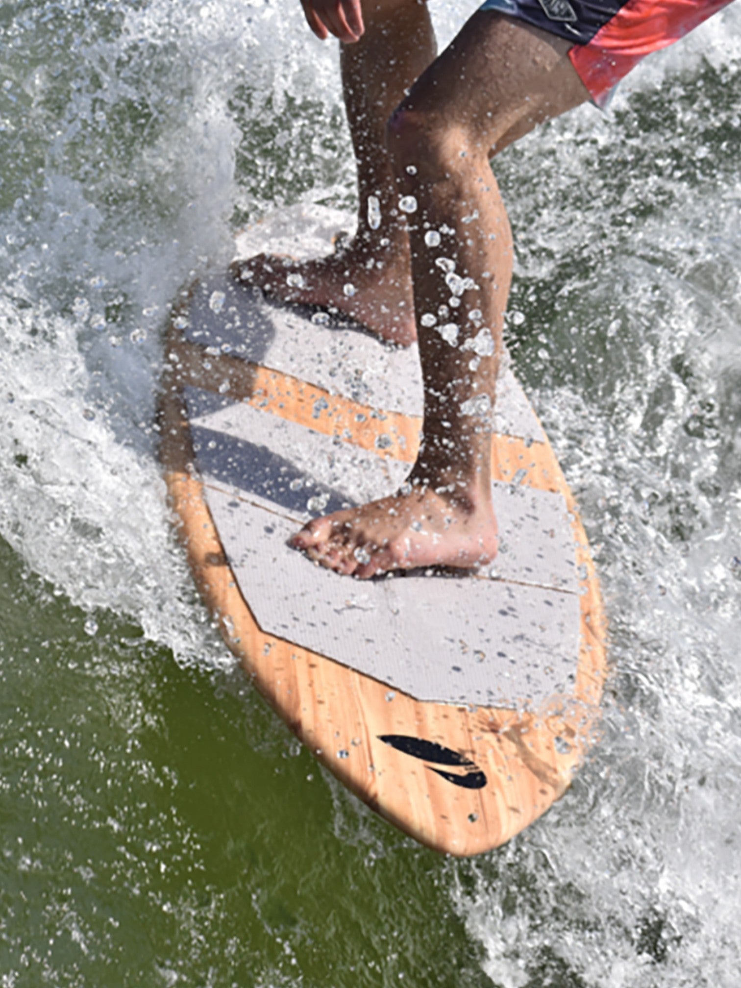 Person using the lake surfer in the water.