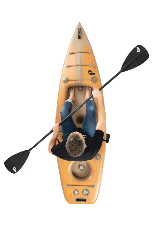 Person paddling the Karve inflatable Kayak against white background