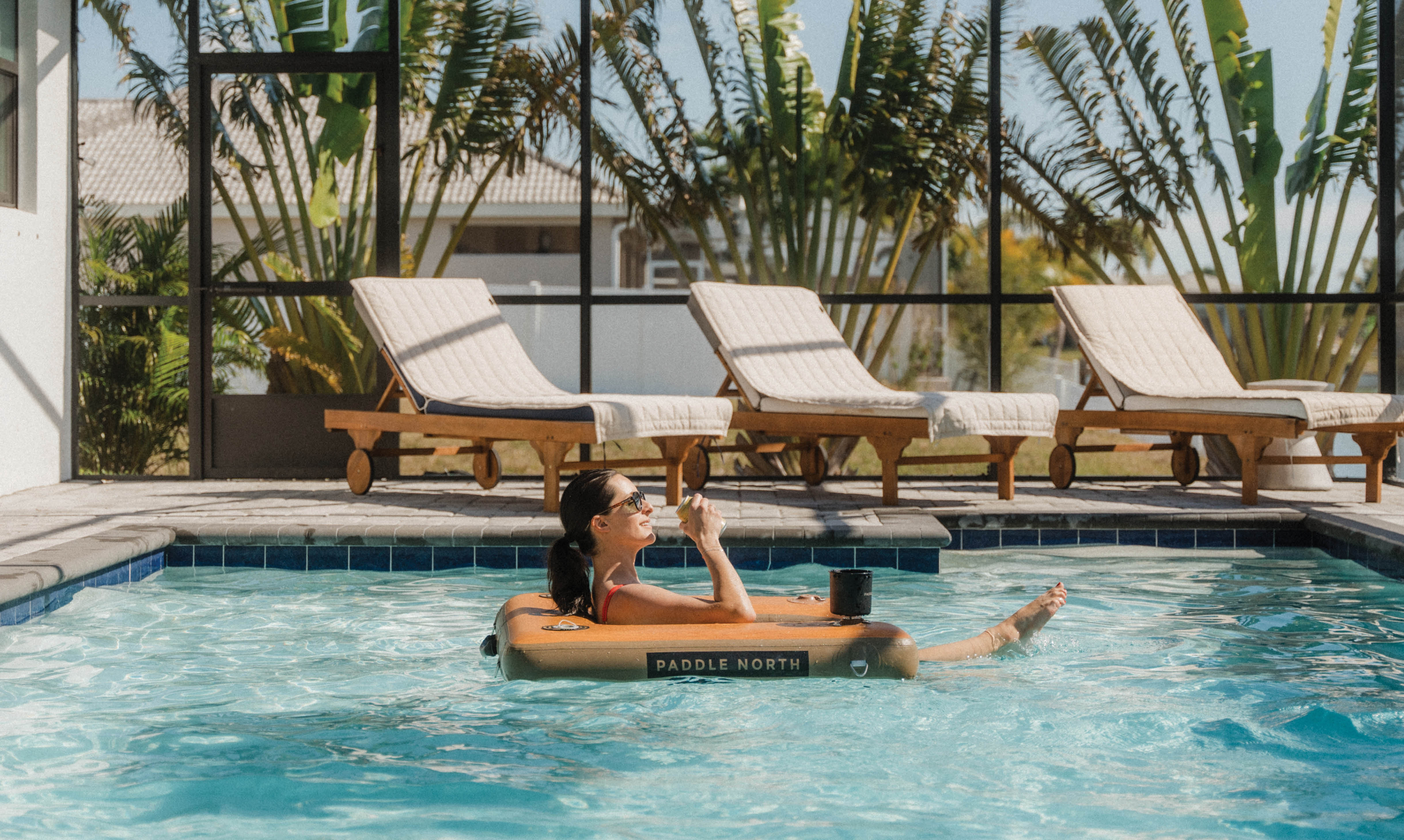 inflatable floating chair in pool