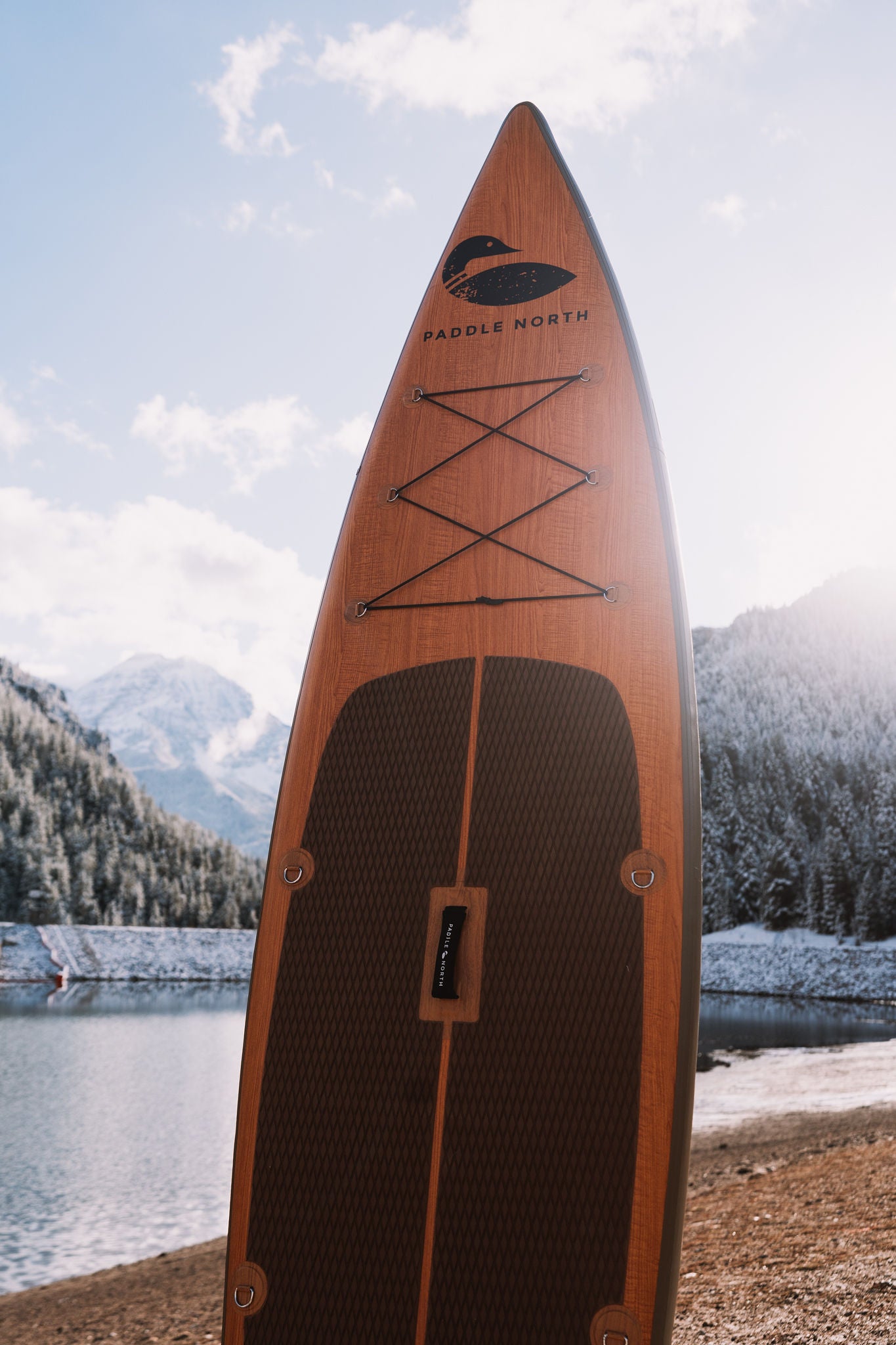 Portager inflatable paddle board standing up near mountains in Utah